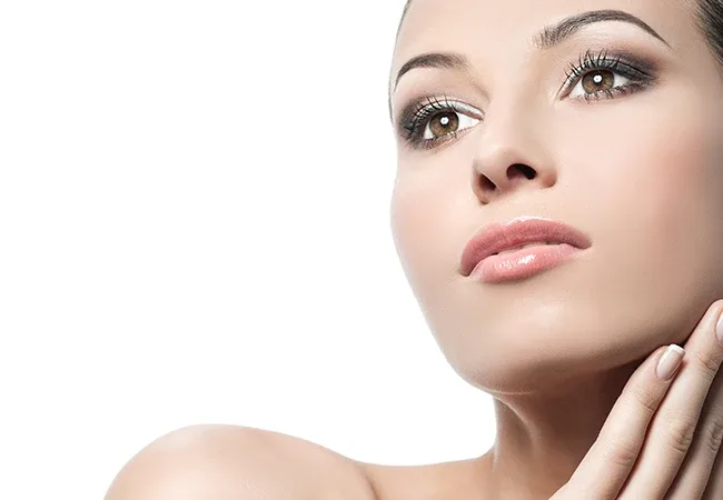 Close-up of a relaxed, rejuvenated face after Dysport® and Xeomin® neuromodulator treatment